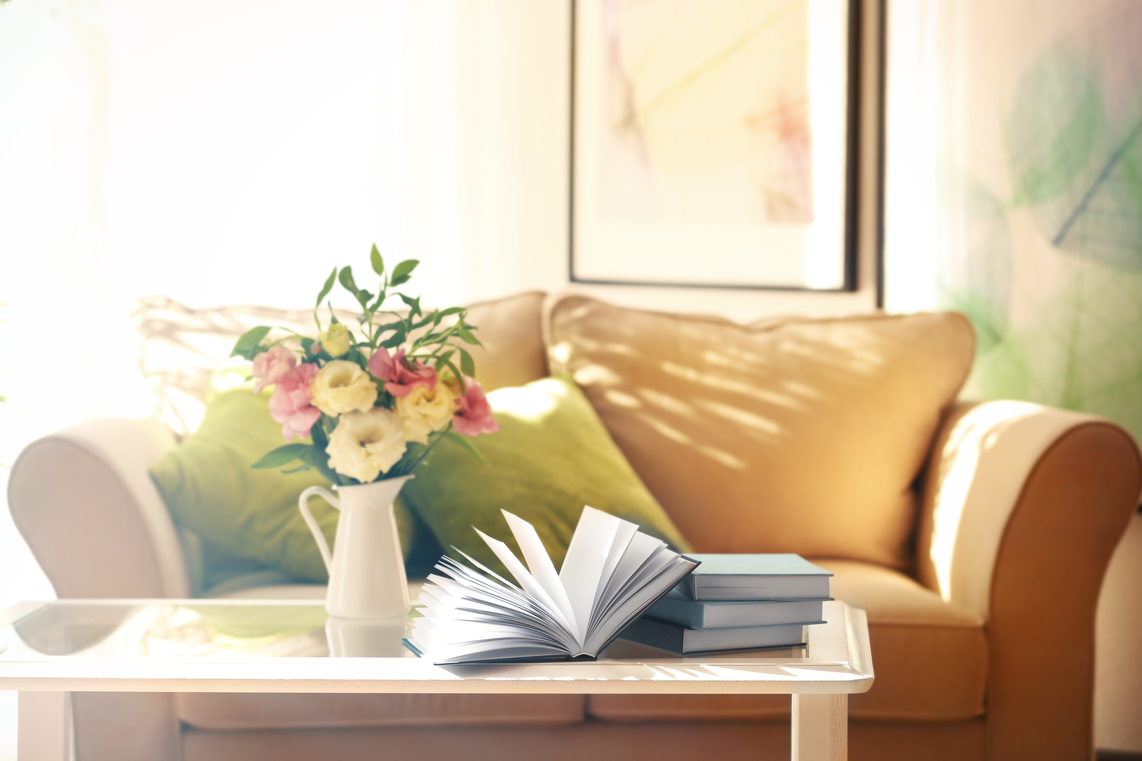 Pile of Books on Table in Living Room